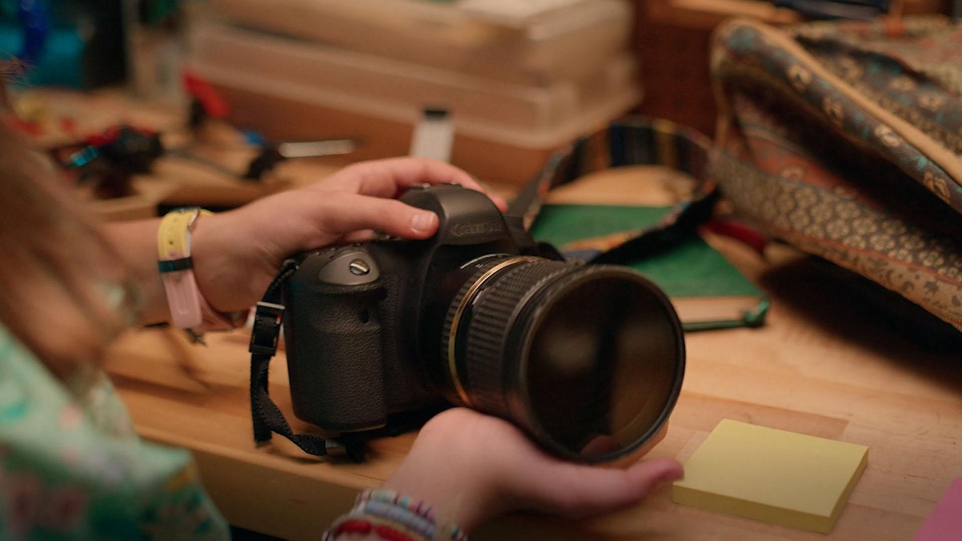 On a trip to Mockingbird Creek, Marta discovers a new digital camera hidden in the bushes.